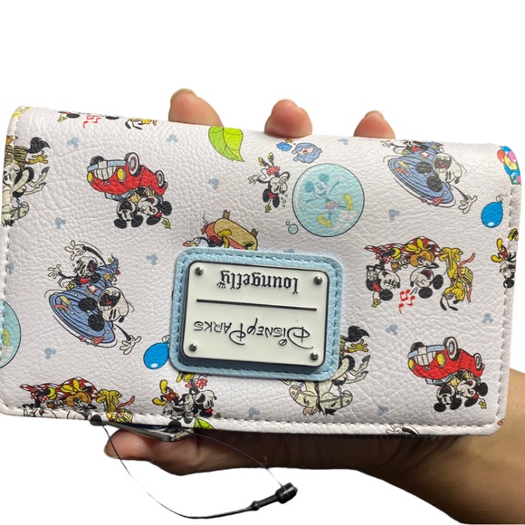 Loungefly Handbags - Disney park Loungefly Mickey  Minnie wallets